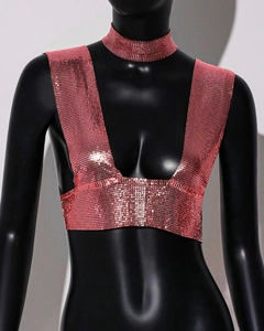 Macro shot of pink metal sequin mesh fabric on a halter top and matching choker accessory
