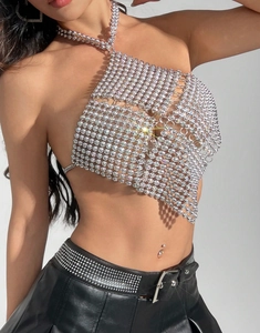 Detailed close-up of sparkling rhinestone mesh halter crop top for party wear