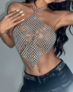 Detailed view of silver rhinestone halter neck crop top with sparkling diamond mesh structure