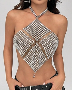 Detail of silver halter body chain with shimmering rhinestones in diamond pattern