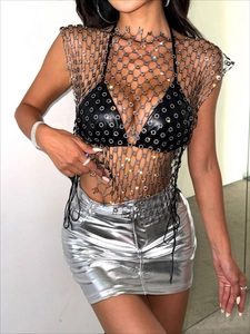 Sexy black rhinestone mesh top paired with metallic silver skirt for party and club wear