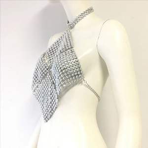 Detail showing high-quality sparkling crystal rhinestones on a halter body chain top