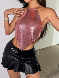 Pink metallic sequin halter top paired with a black pleated PU leather mini skirt