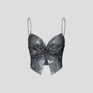 Detail of butterfly-shaped rhinestone crop top with shimmering sequins and thin straps