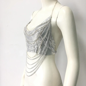 Close-up of silver metal mesh camisole with multi-layer chains and sequin detailing