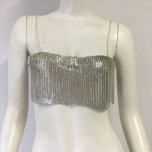 Detailed close-up of silver metal sequin fringe crop top with delicate chain straps