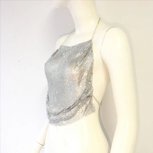 Detail of silver sequin metal mesh halter top featuring delicate metal chains for a party look