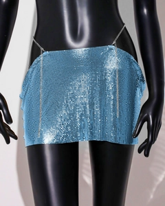 Detailed view of bright blue metallic sequin mini skirt on a black mannequin