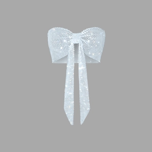 Close-up of sparkling silver rhinestone bow tube top with hanging crystal mesh ribbons