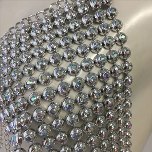 Detail of silver body chain with sparkling AB rhinestones for music festival outfits