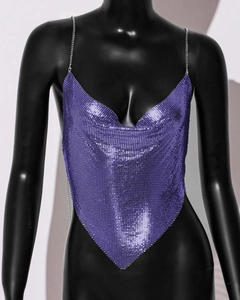 Detail of purple metallic sequin mesh top with chain straps and triangle hemline