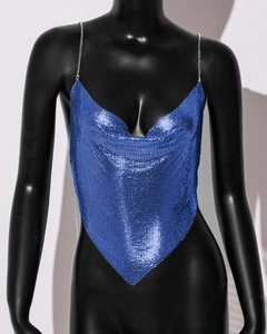 Detail of royal blue metal mesh top featuring sequin texture and chain straps