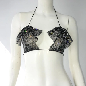 Detail of black mesh halter top with colorful rhinestones and metal chain details