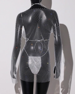 Close-up of sparkling silver rhinestone mesh body chain with long sleeves and halter neck