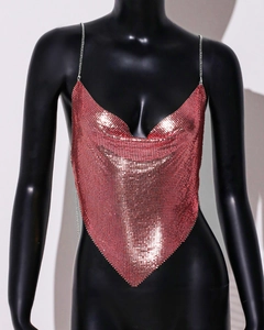 Detailed view of pink chainmail halter top with metallic sequins and plunging neckline