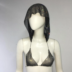 Close-up of black fishnet rhinestone hooded headpiece and matching bikini set for festivals