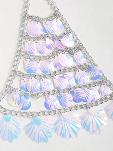 Detailed close-up of iridescent shell sequins on a silver multi-layer body chain vest