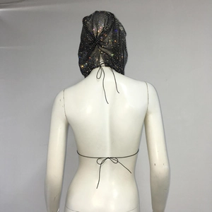 Detail of sparkly rhinestone fishnet hooded top featuring adjustable ties on the back