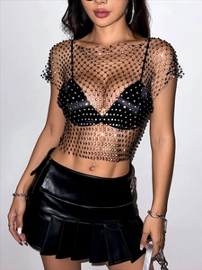 Sparkly rhinestone mesh sleeveless top and faux leather pleated mini skirt outfit