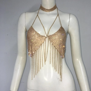Detailed view of the sparkling rhinestone fringe and gold chain halter top set