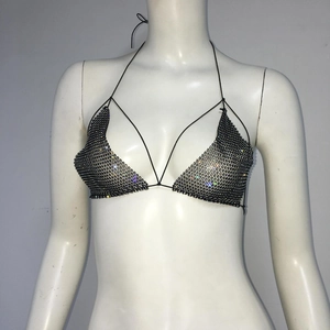 Detailed view of sexy black rhinestone mesh halter bikini top on display mannequin