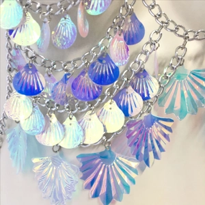 Detailed close-up of multi-layer colorful shell body chain for summer beach parties