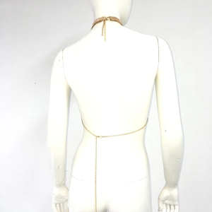 Detailed back view of golden halter body chain with rhinestones and adjustable clasp