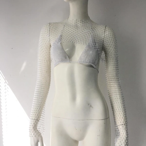 Detailed view of silver rhinestone mesh shrug and matching halter bikini set for women