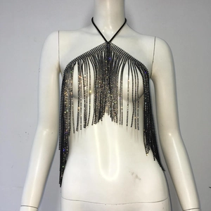 Detailed view of black rhinestone fringe halter body chain on white mannequin