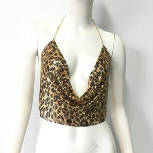 Detail of sexy leopard print metal mesh halter top with deep V-neck and golden chain