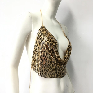 Close-up of leopard print metal sequin halter top with golden chain straps and mesh texture