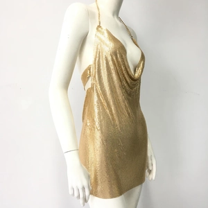 Detail of gold metal mesh dress with luxury drape cowl neck and fine chain straps