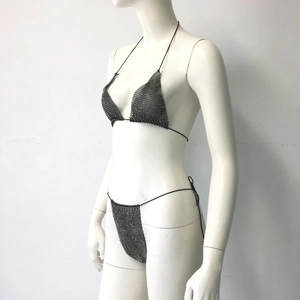 Detail of black metallic mesh bikini with rhinestones and halter neck string tie design
