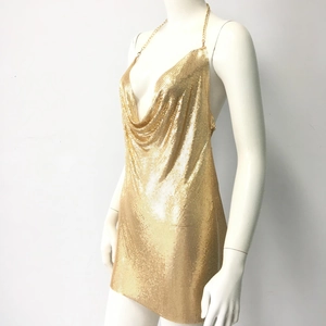 Close-up of shiny gold metallic chainmail dress featuring a deep draped cowl neck design