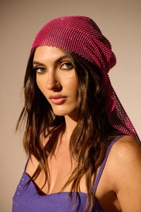 Detailed close-up of fuchsia rhinestone mesh headscarf for festive parties