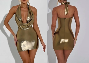 Detailed view of sexy gold metallic bodycon dress featuring halter neck and open back