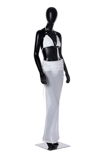 Detail of white bikini top with metal rings and sheer mesh beach skirt on a mannequin