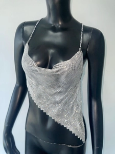 Detail of silver rhinestone chainmail halter top with asymmetric triangle hemline