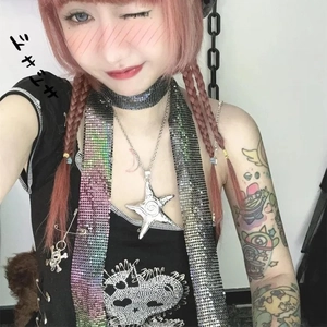 Y2K silver star pendant necklace paired with a stylish metallic sequin mesh scarf
