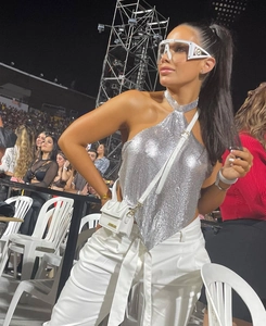 Detail of silver metallic mesh halter top with chainmail sequins for party wear