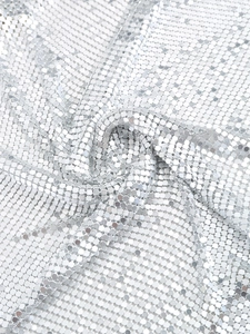 Silver metal mesh sequin halter top featuring a shiny metallic finish for festivals