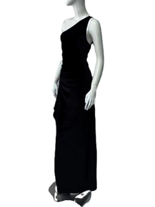 Detail showing the one-shoulder neckline and elegant side draping of the black maxi dress