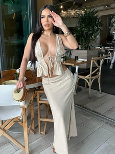 Beige two-piece halter crop top and high waist side slit long skirt vacation set