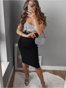 Sparkly silver fringe crop top with black high waist midi skirt for party outfits