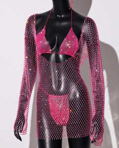 Detail of pink rhinestone fishnet cover-up dress over matching three-piece bikini set