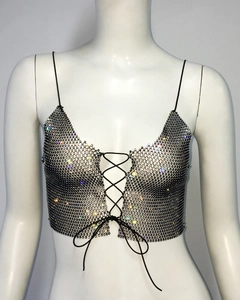 Detail of black rhinestone mesh camisole with thin straps and lace-up bow front