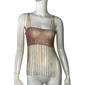 Sparkly gold chainmail top with rhinestones and fringe tassels for party wear