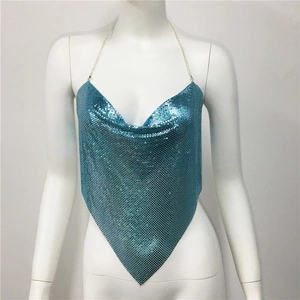 Macro detail of bright blue metallic mesh sequin camisole with silver neck chain