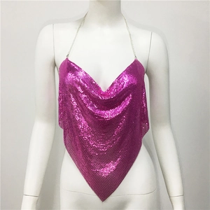 Detail of fuchsia metal mesh halter top with a draped neckline for party wear