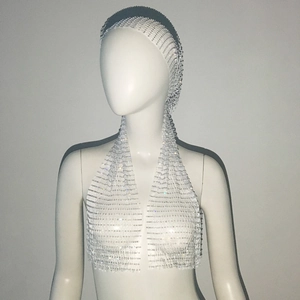 Detailed view of silver mesh rhinestone headpiece on a mannequin display